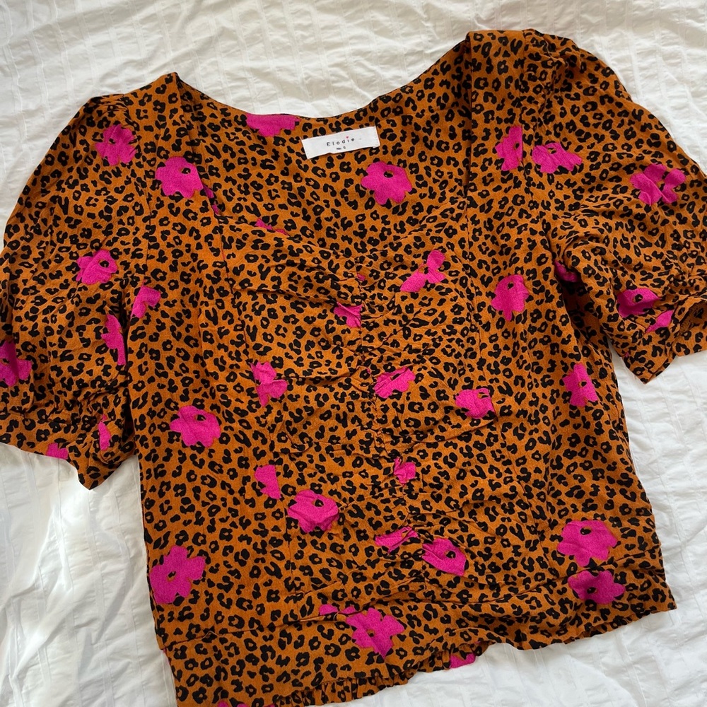 Small Elodie top in burnt orange cheetah print with dark fuchsia flowers